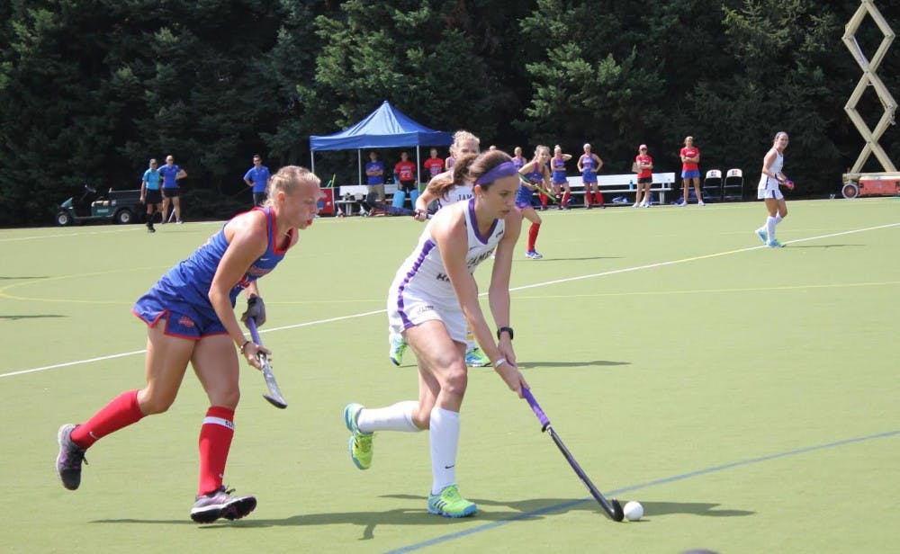 Senior midfield Natalie Marsh tracks a James Madison attacker on September 4. Marsh and the Eagles fell to Princeton 2-1 on District Day Sunday.&nbsp;