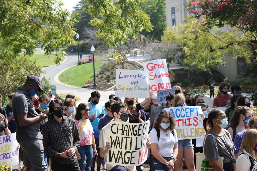 ‘Accept this challenge’: American University staff demand fair wages and safe working conditions in a labor protest on campus