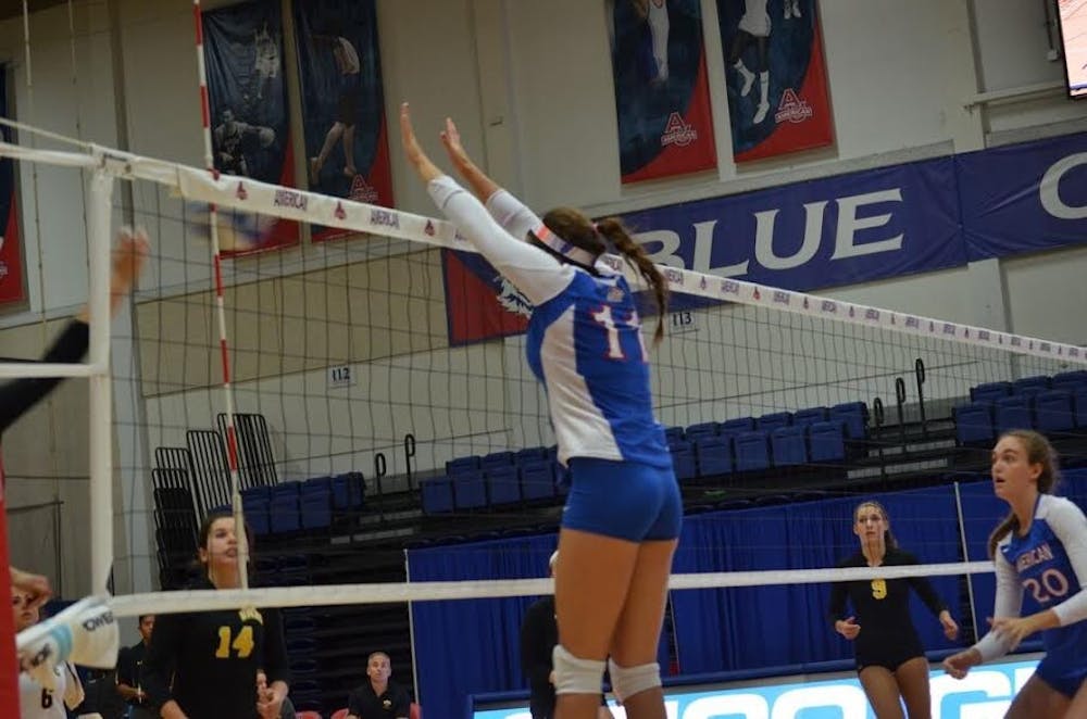 Allison&nbsp;Cappellino goes up for a block in a match against UMBC on Sept. 19&nbsp;