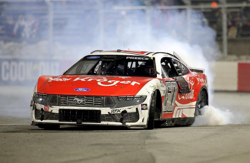 Ryan Preece, driver of the #60 Kroger/Coca-Cola Ford, celebrates with a burnout after winning the Cook Out Clash at Bowman Gray Stadium on February 04, 2026, in Winston-Salem, North Carolina.

