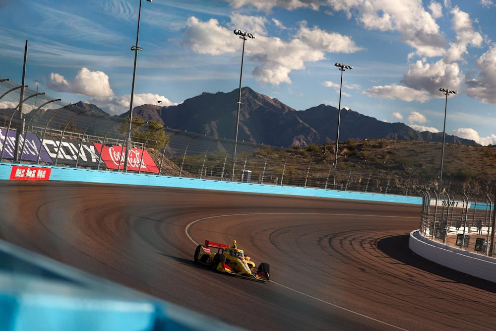 Four-time and reigning IndyCar Champion Alex Palou hustles his No. 10 DHL Honda through turns one and two at Phoenix Raceway during the Unser Open Test February 18, 2026. (Photo by Chris Owens/Penske Entertainment)
