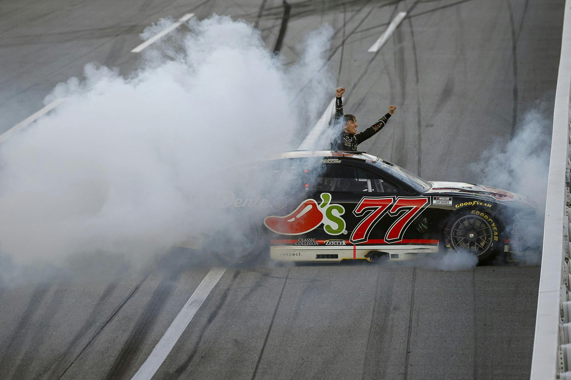 Carson Hocevar, driver of the #77 Chili's Ride the 'Dente Chevrolet, celebrates after winning the NASCAR Cup Series Jack Link's 500 at Talladega Superspeedway on April 26, 2026 in Talladega, Alabama. (Photo by Sean Gardner_Getty Images).jpg