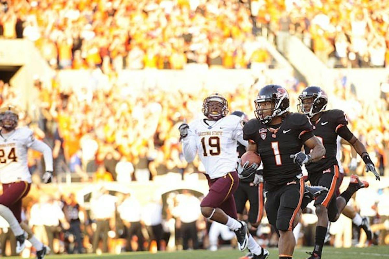 BREAKING AWAY: Oregon State junior back Jacquizz Rodgers carries the ball against ASU on Saturday. The Beavers got the win 31-28 and Rodgers finished with 54 yards and two touchdowns. (Photo COurtesy of the Daily Barometer)