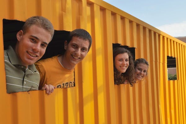 RECYCLING FOR HOPE: Billy Walters, Clay Tyler, Susanna Young and Gabrielle Palermo are working on converting shipping containers into medical clinics for expecting mothers in Africa. They are competing against four other college teams for the chance to win $5,000.  (Photo by Christopher Leone)