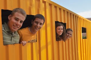 RECYCLING FOR HOPE: Billy Walters, Clay Tyler, Susanna Young and Gabrielle Palermo are working on converting shipping containers into medical clinics for expecting mothers in Africa. They are competing against four other college teams for the chance to win $5,000. (Photo by Christopher Leone)