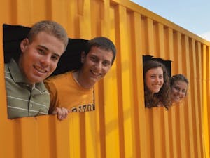 RECYCLING FOR HOPE: Billy Walters, Clay Tyler, Susanna Young and Gabrielle Palermo are working on converting shipping containers into medical clinics for expecting mothers in Africa. They are competing against four other college teams for the chance to win $5,000.  (Photo by Christopher Leone)