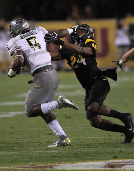 Freshman forward Cali Farquharson (17) controls the ball with freshman mid-fielder Tommi Goodman (5) trailing in the Sun Devil’s 5-4 double overtime win over USC on Sept. 28. (Photo by Sam Rosenbaum) 