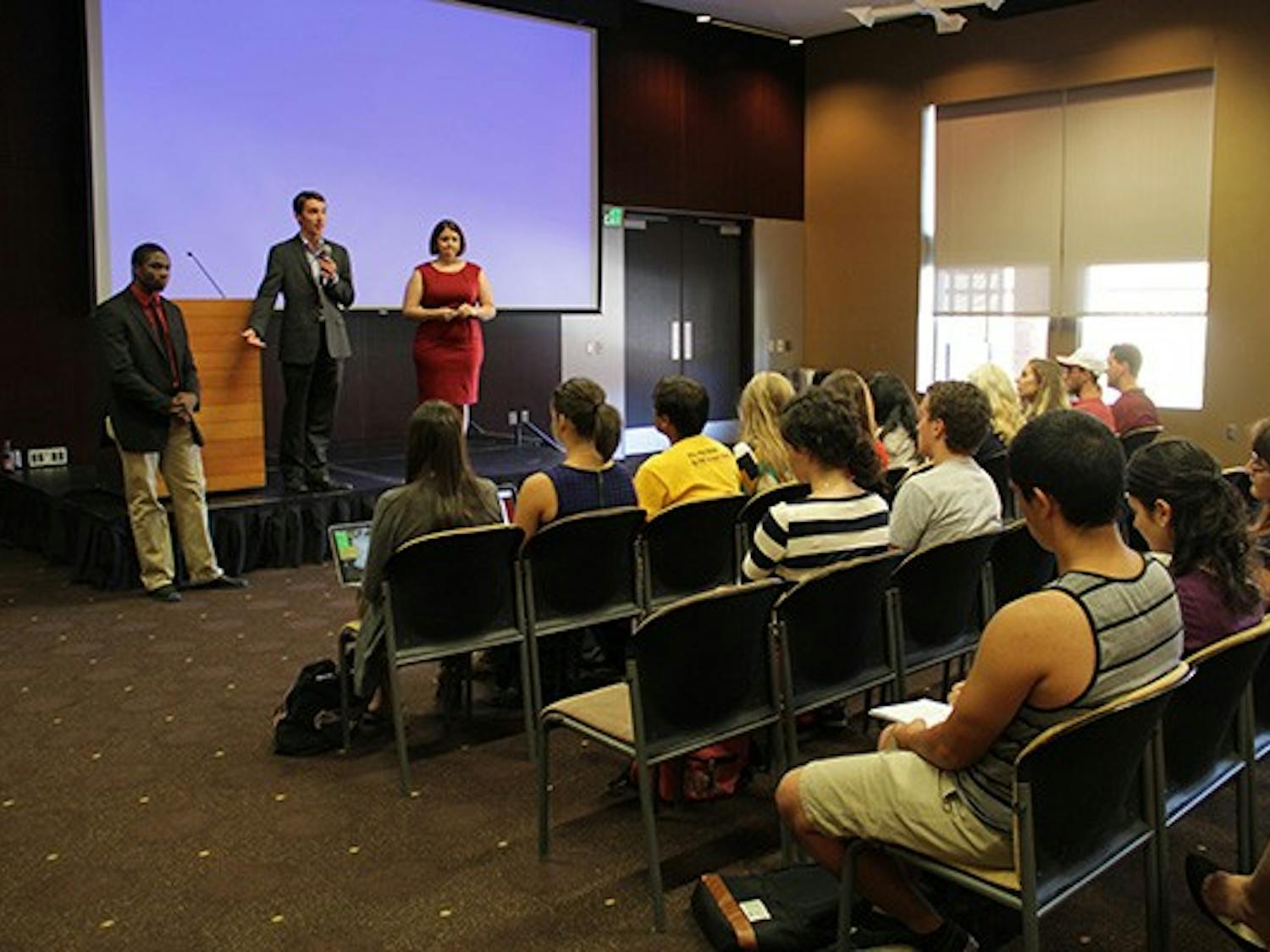 Tempe Undergraduate Student Government President Jordan Davis, Graduate and Professional Student Association President Megan Fisk and Polytechnic Undergraduate Student Government President Franz Ferguson answer students’ questions during an open forum at the Memorial Union on Monday afternoon about the Athletic Fee Bill, which was proposed by student government earlier this month. 