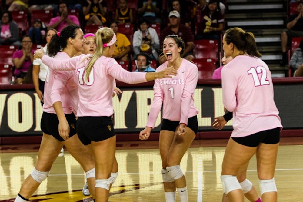 Junior setter Bianca Arellano celebrates a point in the third set during the match vs Washington State on Sunday, Oct. 19th, 2014, at Wells Fargo Arena in Tempe. The Sun Devils would rally from two sets down to beat the Cougars 3-2. (Photo by Daniel Kwon)