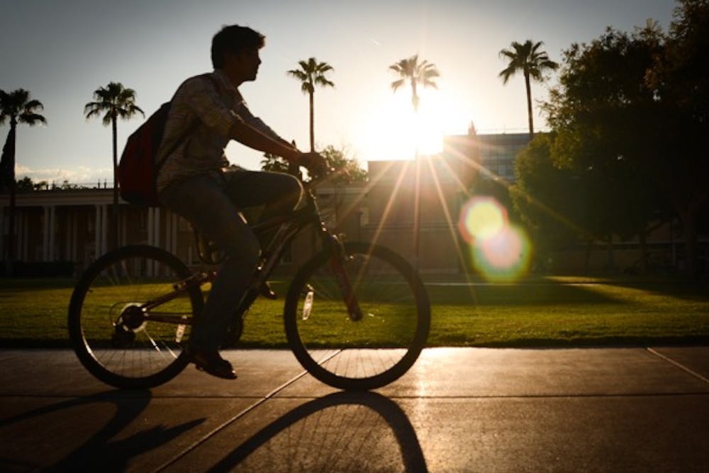 FEELING LIKE FALL: The leaves on many trees outside of the Student Services building on ASU’s Tempe Campus are changing color. The recent cold weather has many students bundling up as they travel from class to class. (Photo by Scott Stuk)