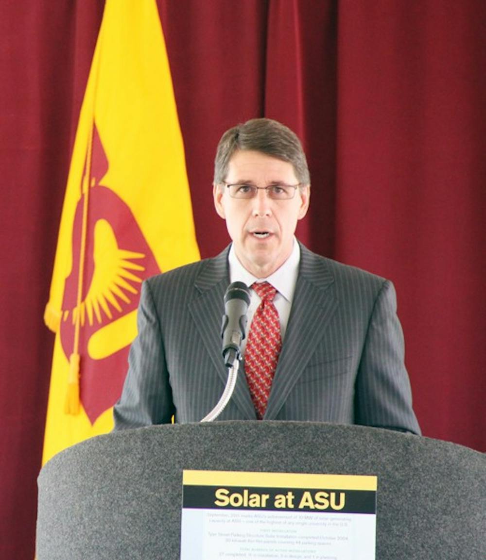 BEING A LEADER: Executive Vice President of ASU Morgan Olsen speaks at the ASU solar field at the West campus for the 10 Megawatts Celebration on Sept. 20. ASU has been ranked as one of the top 25 sustainable schools for its wide variety of sustainable programming. (Photo by Rosie Gochnour)