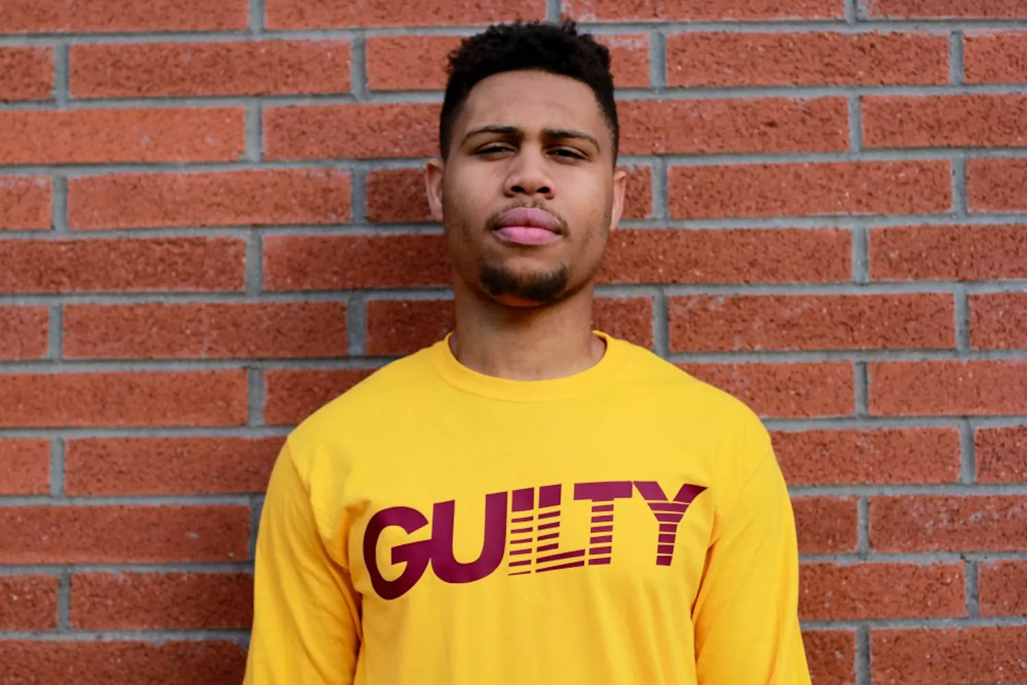 Amir Harris, 21, poses for a photo. 