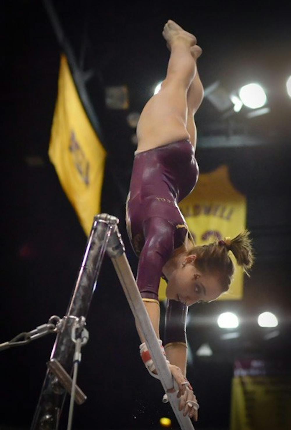 Going Vertical: ASU freshman Samantha Seaman competes on the bars during the Sun Devils’ loss to Oregon State, 196.950 to 194.800, in Tempe on Sunday. Even with the loss, the Sun Devils posted their highest team score of the season. (Photo by Aaron Lavinsky)