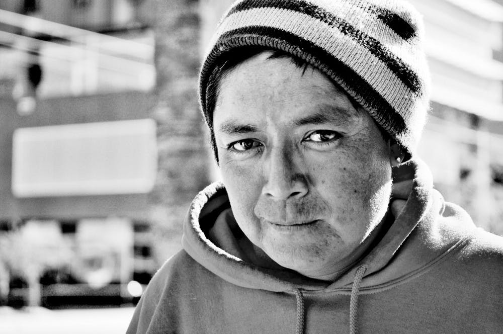 RAIL RIDER:  "I'm really sorry," Keewee Brown said after asking for change to ride the light rail. After muttering about walking all day and apologizing for not being photogenic, Brown shyly posed for a portrait and disappeared with the change. (Photo by Sierra Smith)