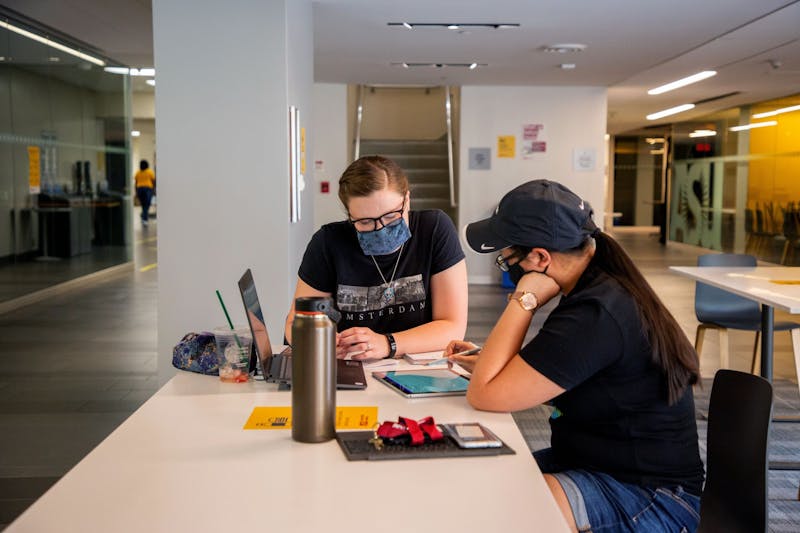 ASU civil engineer then-sophomores Jillian Franke and Catherine Baxter sit inside the Memorial Union during a tutoring session on Friday, August 28, 2020, at the Tempe Campus.