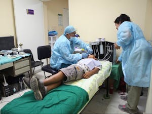 A repurposed massage table served as a dental station for an Engineering Projects in Community Service clinic in El Salvador in August 2014.