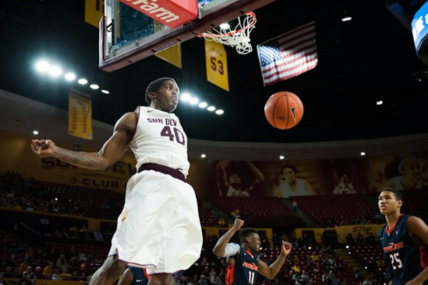 Senior forward Shaquille McKissic dunks the ball in a game against Pepperdine, Saturday, Dec. 13, 2014 at Wells Fargo Arena in Tempe. After trailing the entire first half, the Sun Devils came from behind and defeated the Waves 81-74. (Photo by Ben Moffat)