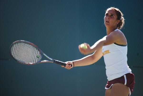 Freshman Stephanie Vlad stretches out her arm to toss the ball for a serve against Saint Mary’s on March 2.  The Sun Devils will rely on Vlad when they take on Oregon this weekend. (Photo by Murphy Bannerman)