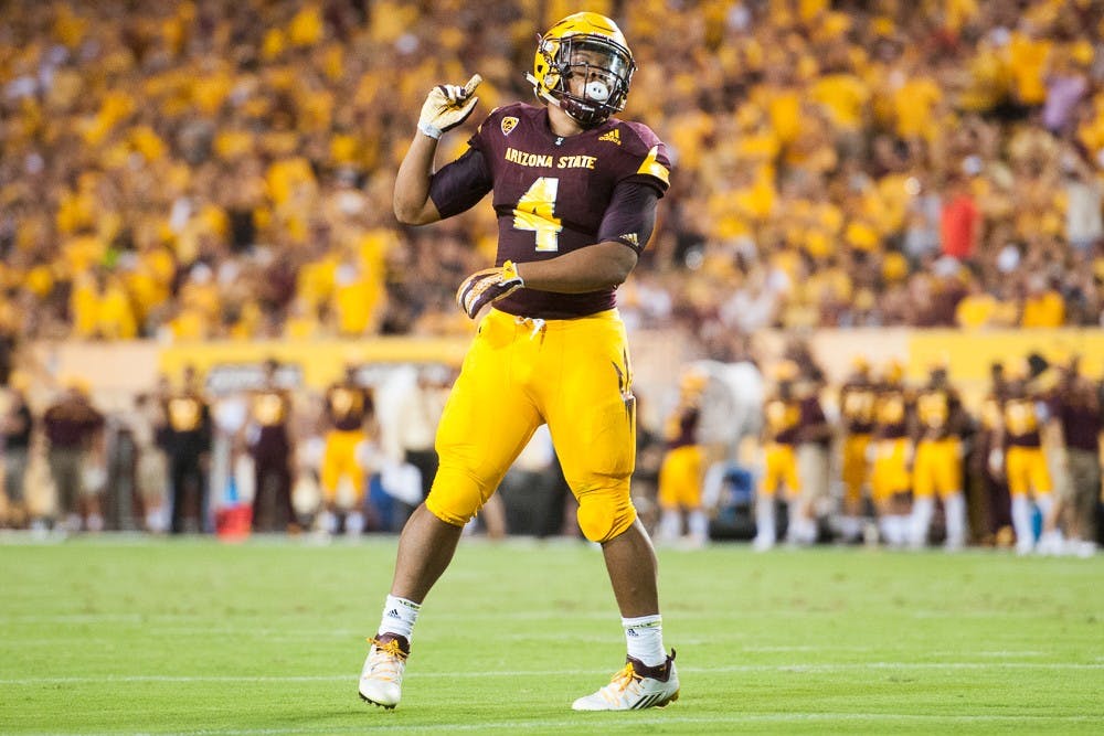 Sophomore running back Demario Richard celebrates after scoring a touchdown against Cal Poly on Saturday, Sept. 12, 2015, at Sun Devil Stadium in Tempe.