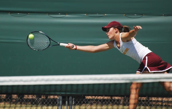 Freshman Ebony Panoho chases after a ball during ASU's home meet vs. UCLA. The Sun Devils dropped both weekend games at home to Cal and Stanford. (Photo by Murphy Bannerman)