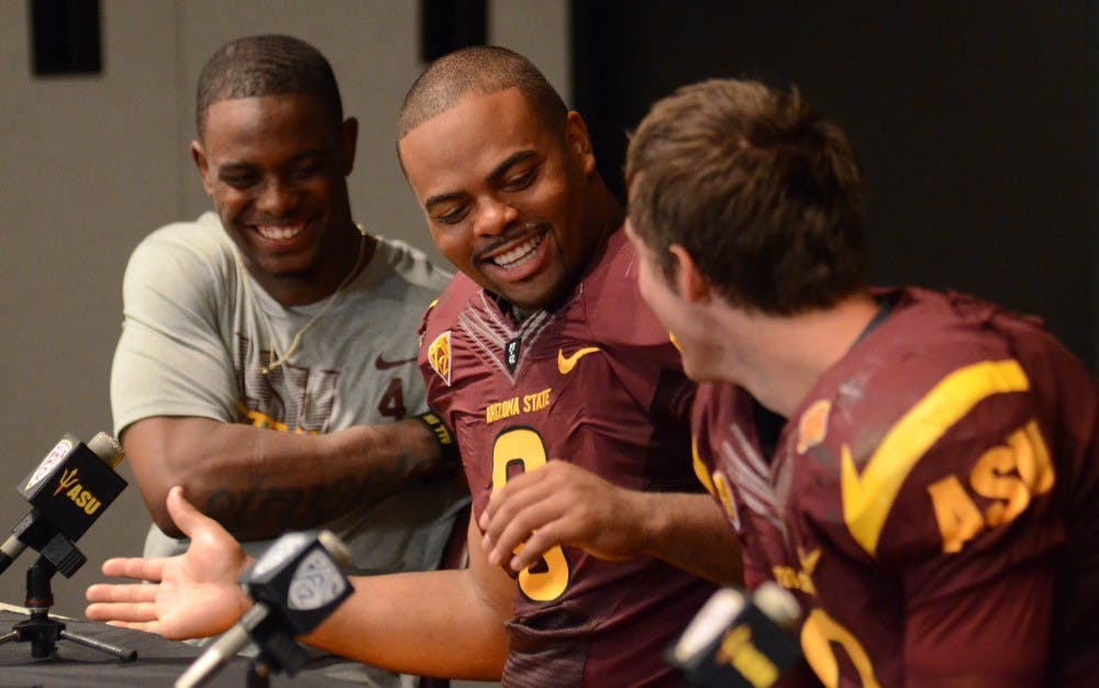 Alden Darby, Brandon Magee and Taylor Kelly joke with each other during their post game press conference on Thursday night. 