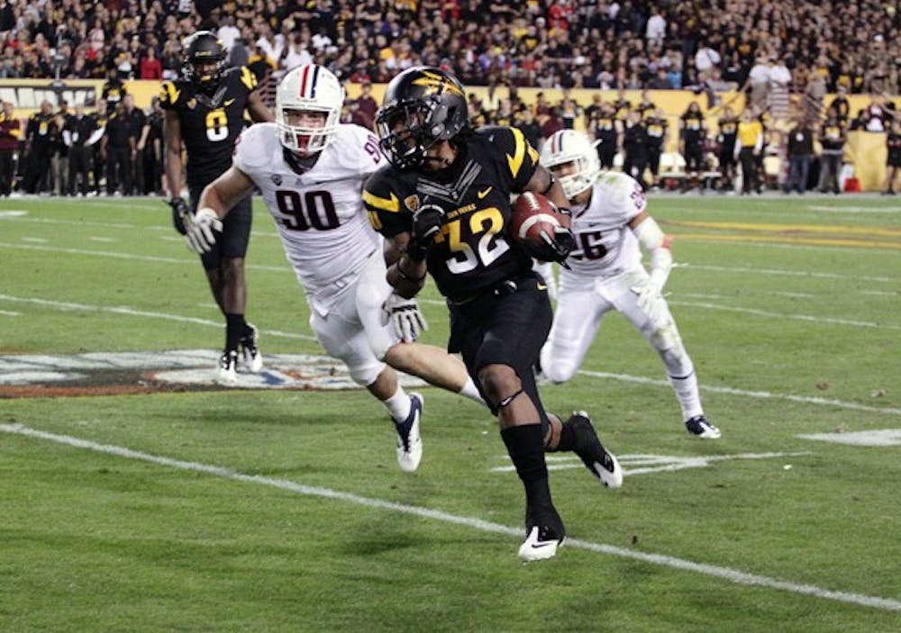 Spring Fling: ASU sophomore quarterback Brock Osweiler warms up before the Sun Devils game against UCLA on Nov. 26. Osweiler is now the undisputed starter after the retirement of both Steven Threet and Samson Szakacsy. (Photo by Aaron Lavinsky)