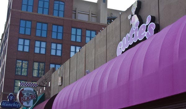 NEW DOGS: Cutie's is the newest hot dog venue to arrive on Mill this fall. By promoting "Not Your Average Weenie," they hope to attract the late-night crowd of bar hoppers by staying open until 3 a.m. (Photo by Annie Wechter)