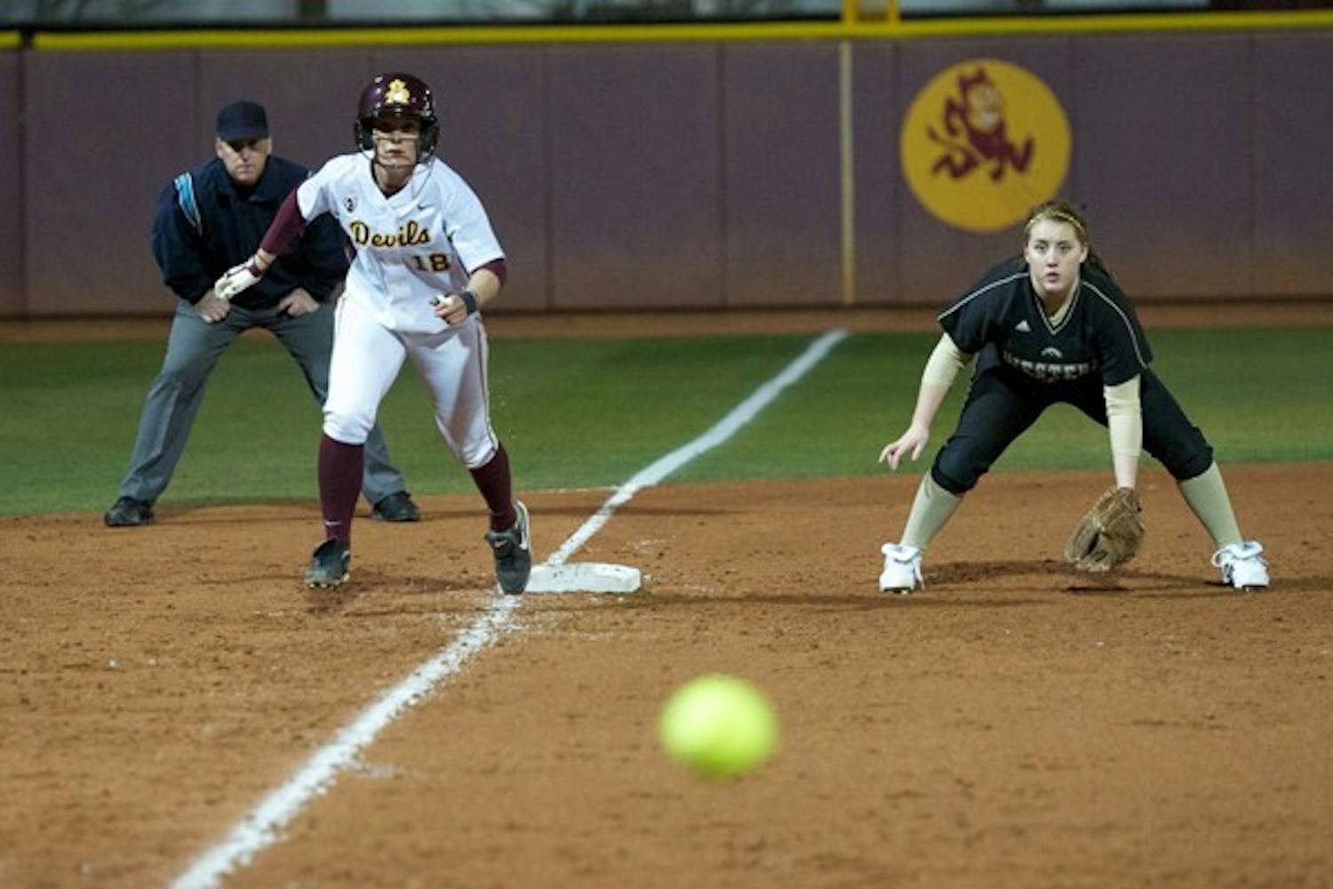 ASU senior middle-infielder Michelle Nulliner gets a jump off third base during the Sun Devils’ season opening victory on Feb. 10. ASU swept the weekend’s Littlewood Classic by run ruling all four opponents. (Photo by Michael Arellano)
