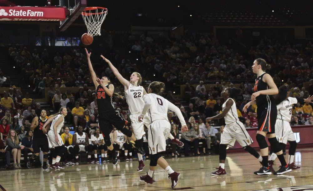 Sophomore Quinn Dornstauder defends ASU’s basket as the team faces No. 9 Oregon State on Jan. 25, 2015. (Kat Simonovic/ The State Press)