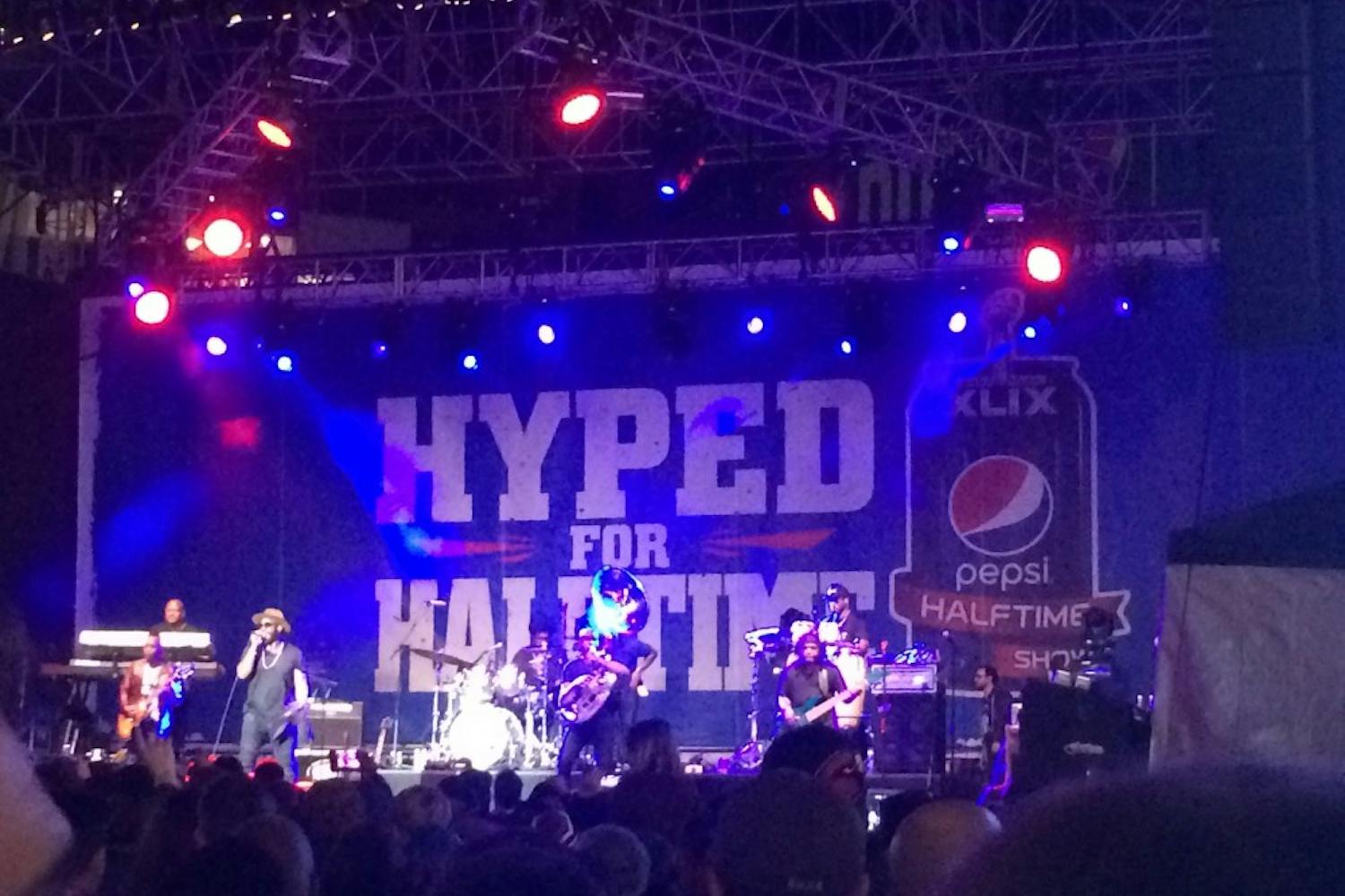 The crowd cheers on The Roots as they perform at the Hyped for Halftime in downtown Phoenix on Saturday, Jan. 31, 2015. (Zackary Moran/The State Press)