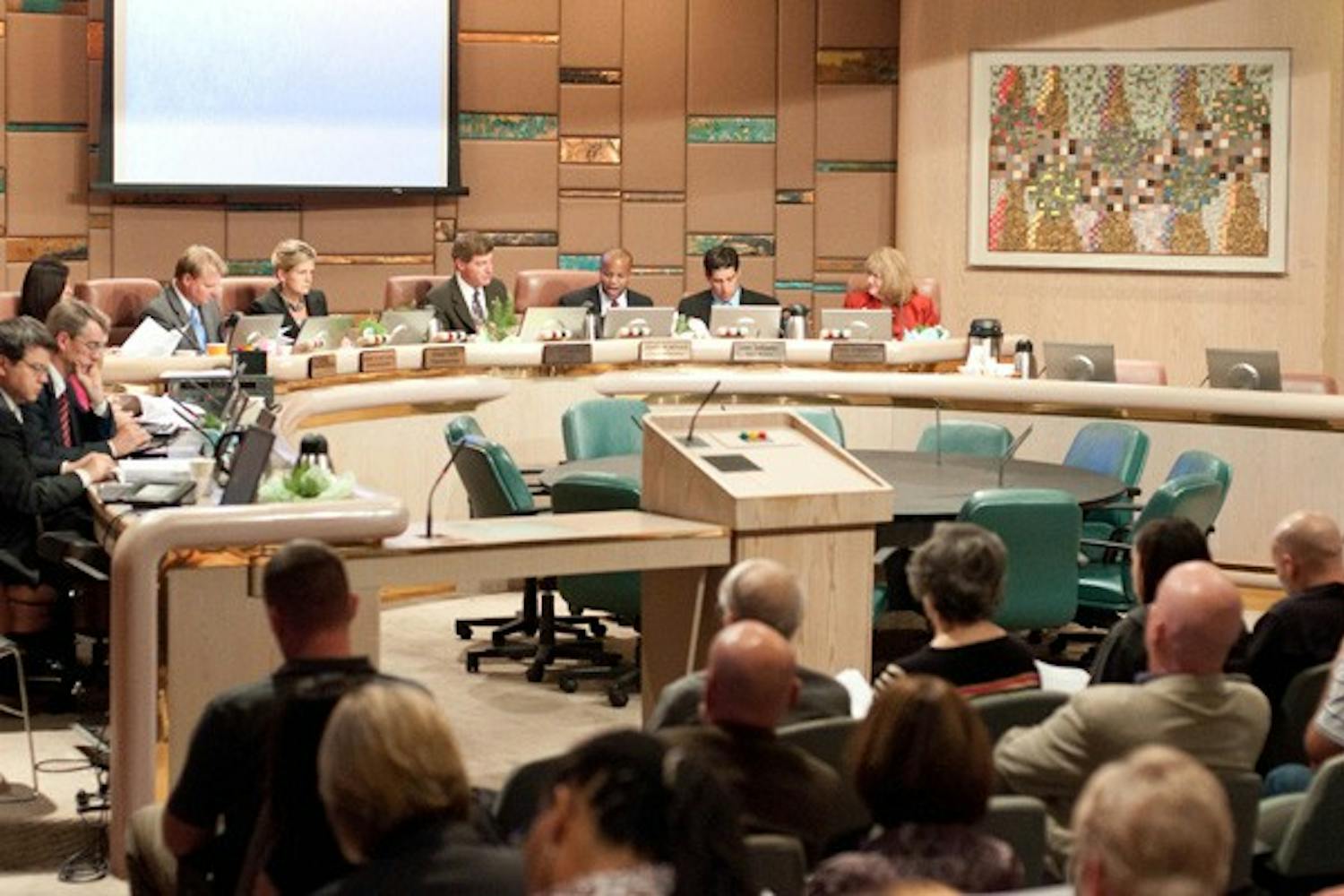 HIGH ON THE AGENDA: Tempe Mayor Hugh Hallman presides over a city council meeting on Thursday night before a highly anticipated vote on a zoning ordinance for medical marijuana. (Photo by Aaron Lavinsky)