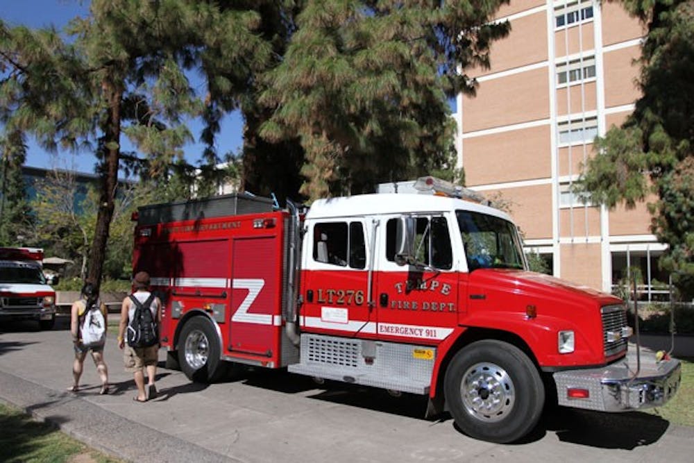 RED ALERT: A Tempe fire truck is parked in front of the Language and Literature Building in response to a 911 call on Monday afternoon. (Photo by Nikolai de Vera)
