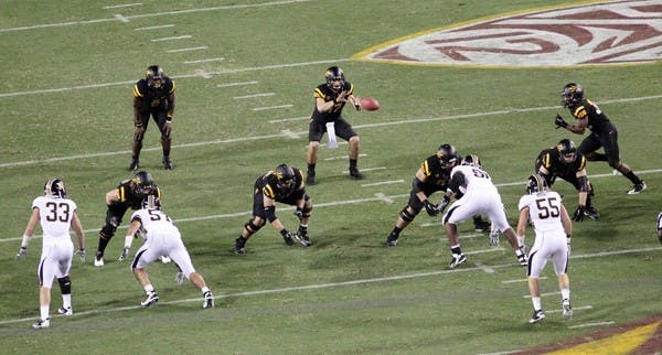 ON DEMAND: ASU’s offensive line waits for junior quarterback Brock Osweiler to call out the snap at the Missouri game on Sept. 9. The O-line looks to improve its pass protection for Osweiler when the Sun Devils face USC on Saturday. (Photo by Beth Easterbrook)