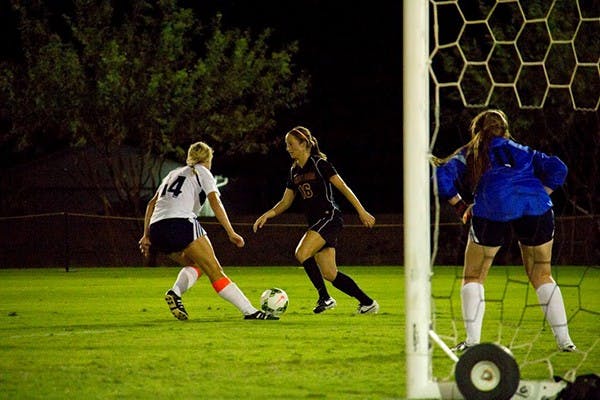 Redshirt senior forward Jessica Domenichelli looks to find an open teammate at a scrimmage against NAU on Aug. 15 in West campus. 
