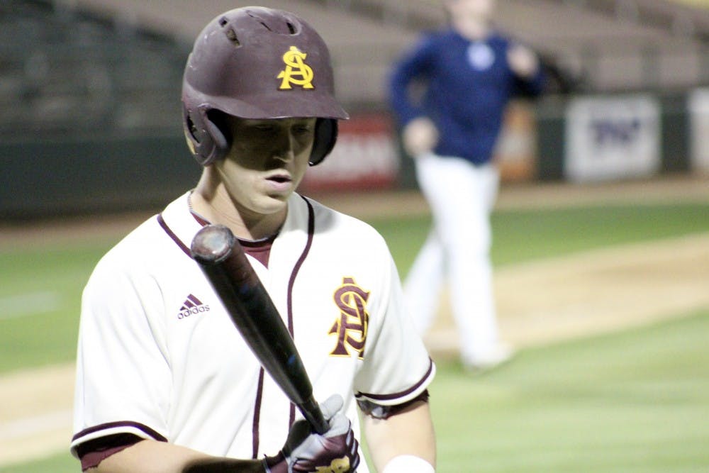 ASU baseball junior catcher Brian Serven walks back to the dugout after striking out in the ninth inning of a 6-3 loss to San Diego on Tuesday, March 22, 2016 at Phoenix Municipal Stadium.&nbsp;