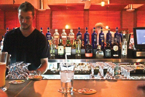 ASU alumnus, Julian Wright opened his third restaurant on Mill Avenue, the Handlebar and Grill. Wright also owns La Bocca Urban Pizzeria and Wine Bar and Canteen Modern Tequila Bar. (Photo by Marissa Krings)