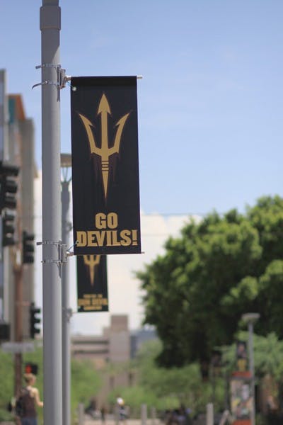 TAKING OVER: The new ASU logo decorates poles around the Downtown campus. (Photo by Lillian Reid)