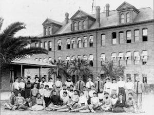 Class portrait in front of Old Main in the original Normal School Building, taken in 1901.