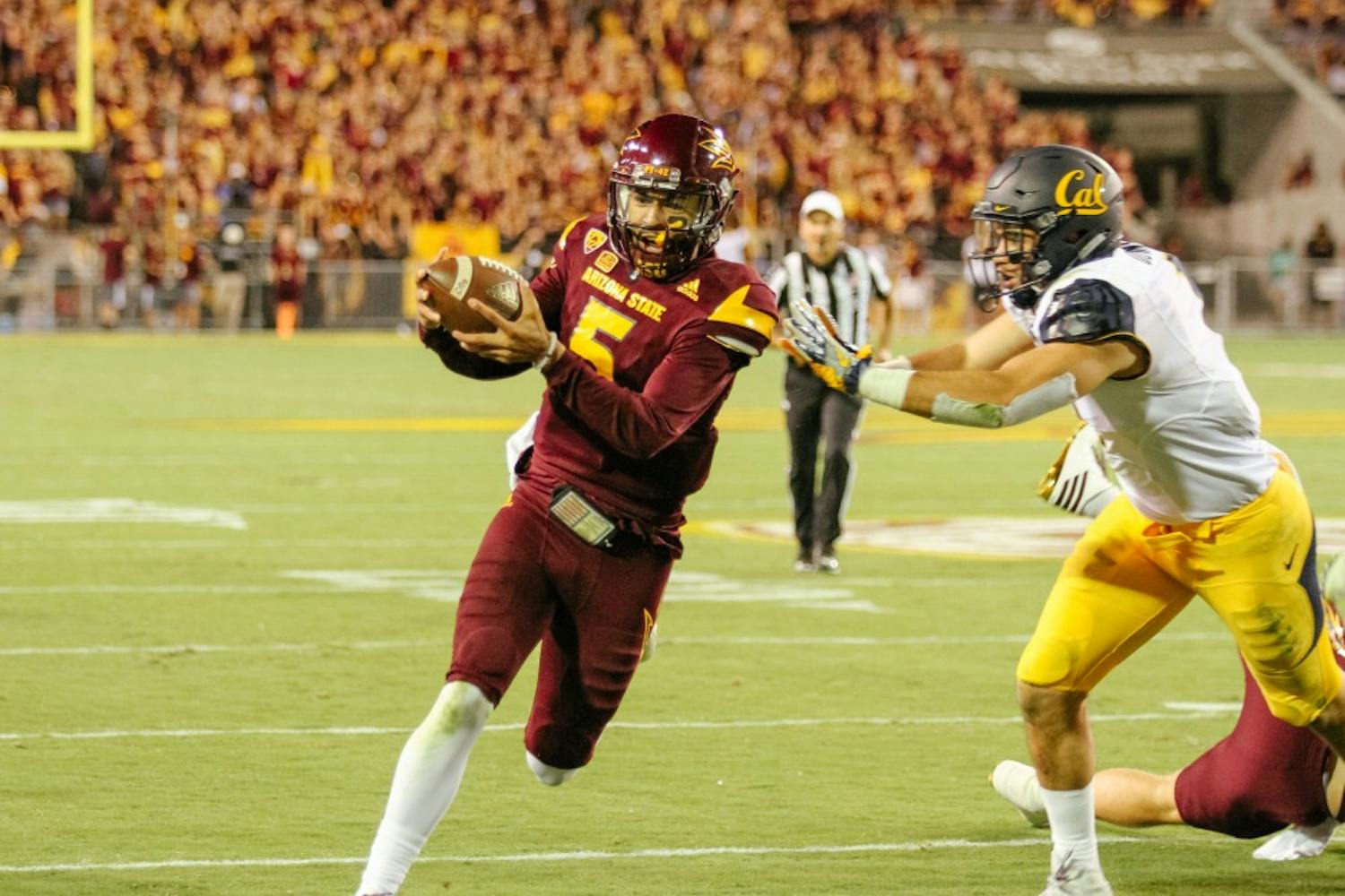 ASU quarterback, Manny Wilkins (5) crossing the goal line for a touchdown during the first half of the football game versus the California Golden Bears in Tempe, Arizona, on Saturday, Sept. 24, 2016.