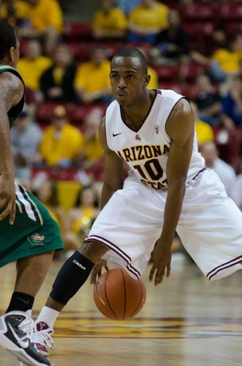 FULL SPEED AHEAD: Senior guard Jamelle McMillan looks for an option during ASU’s recent game against UAB. Just days after falling in the championship game of the Great Alaska Shootout, the ASU men’s basketball team gets back to the grind against Baylor Thursday and Richmond Sunday. (Photo by Aaron Lavinsky)