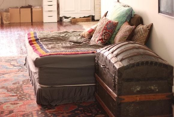 Bed creatively made into a couch. Photo courtesy of tumblr.com.
