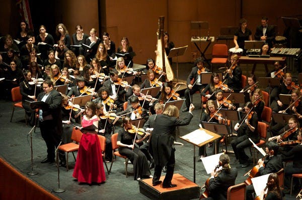 MUSIC OF REMEMBRANCE: Maestro Israel Yinon conducts an orchestra comprised of students from ASU's School of Music as they perform works composed by Jews during the Holocaust. "Composers in the Concentration Camp" was a free event in Gammage auditorium. (Photo by Michael Arellano)
