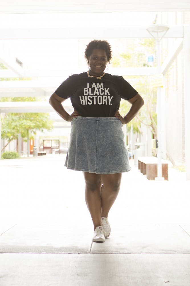 Biochemistry freshman Raven Gibson sporting her clothing line called Legendary Rootz. 