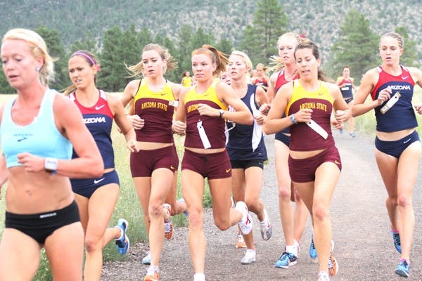 ON COURSE: ASU runners redshirt junior Catherine Loden, redshirt junior Kate Lydy, and senior Kauren Tarver match each others’ paces as they race through the George Kyte Invitational on Saturday. The Sun Devil women’s team placed second, while the men took the title in Flagstaff. (Photo courtesy of Jeremy Hawkes)