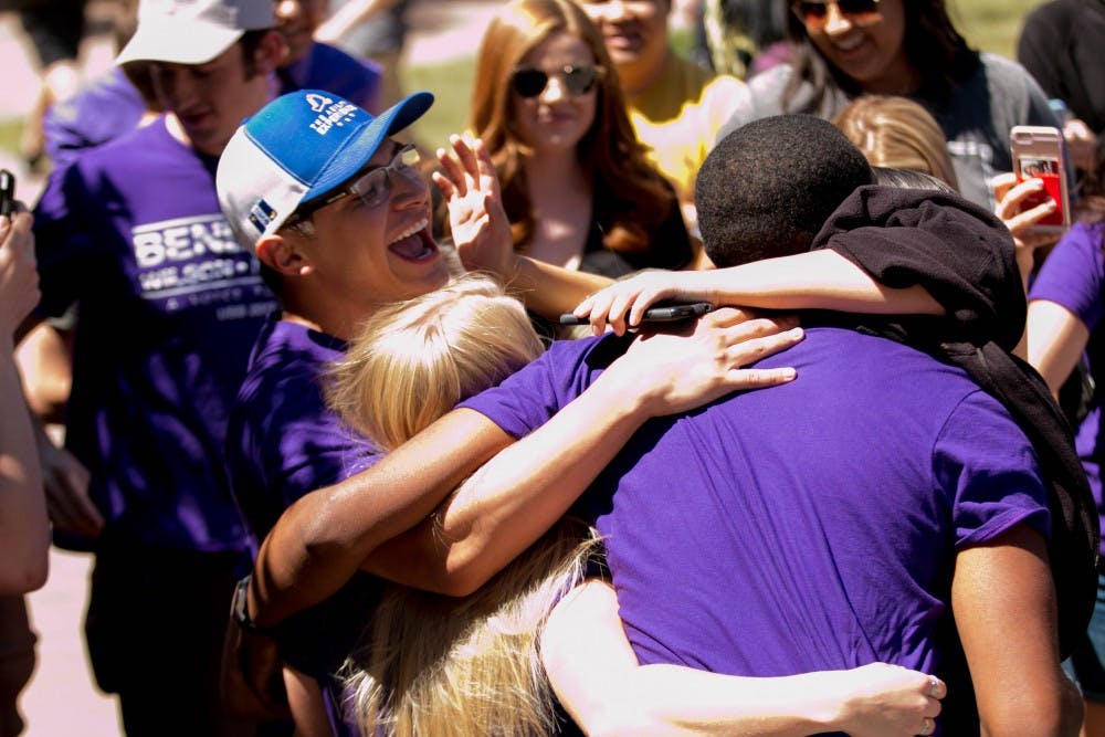The Benedict Wilson Nnagbo campaign members celebrate after it was announced that their campaign won for USG 2017 at Old Main on the Tempe campus on Thursday, April 6, 2017. 