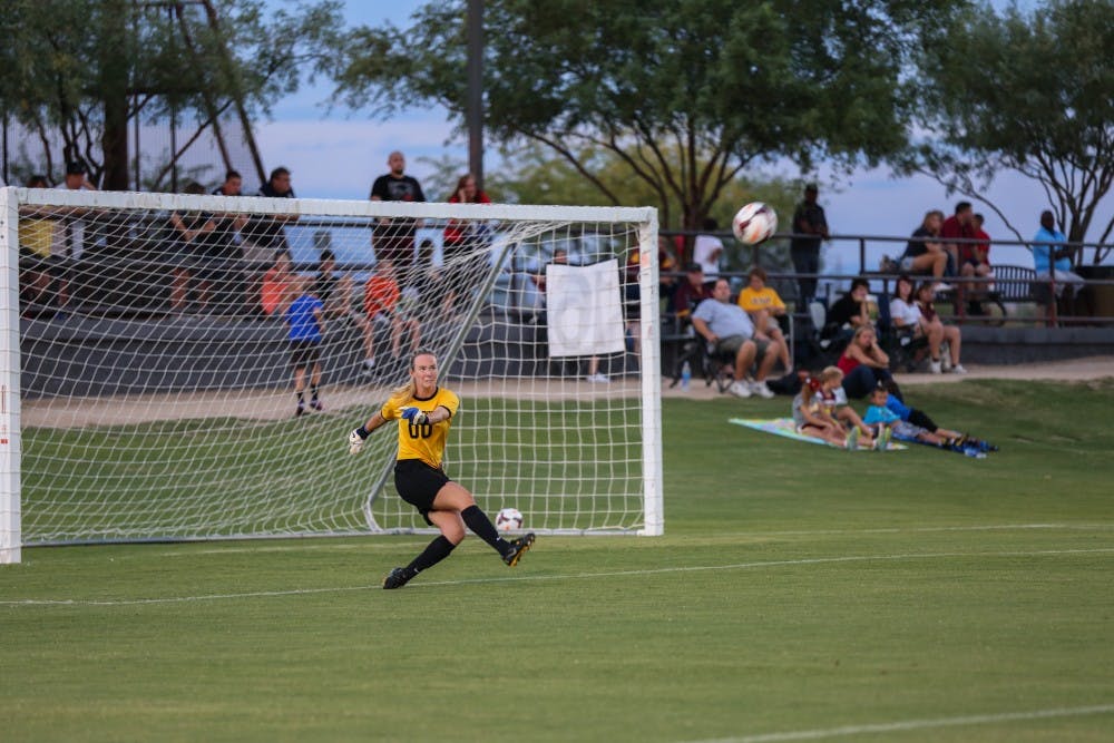 Goal Keeper Chandler Morris kicks off the ball during a scrimmage at Reach 11. (Photo by Arianna Grainey)
