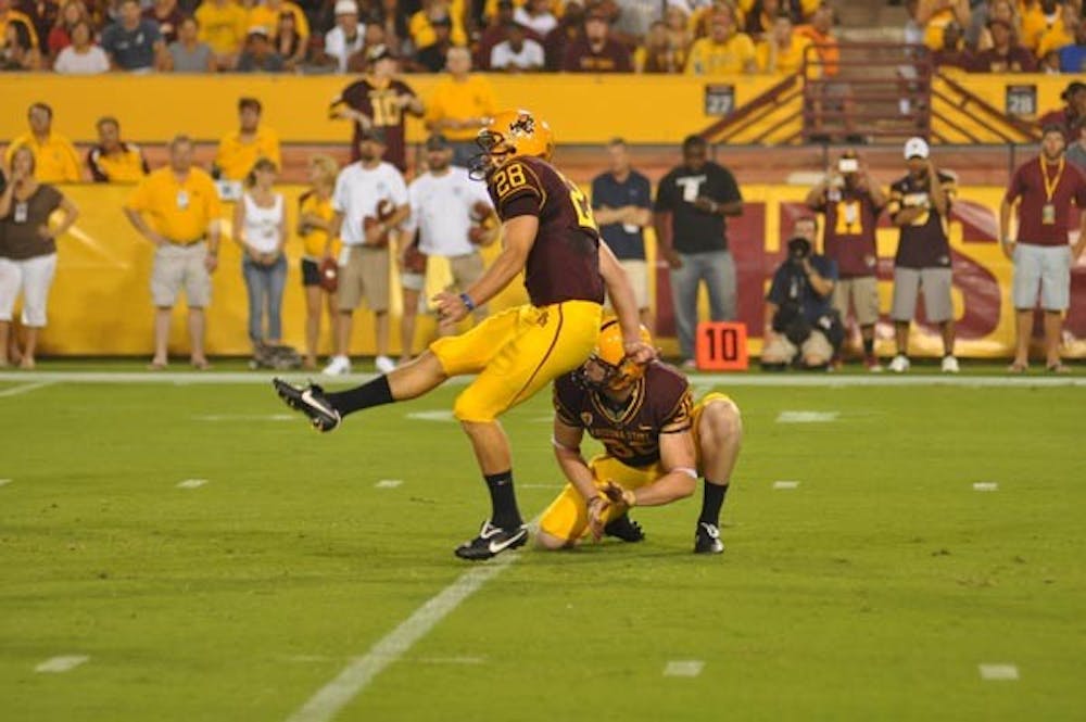 LONG RANGE: Senior kicker Thomas Weber drills a kick during last week's game against Portland State. Weber practiced "may day" field goals in Thursday's practice in preparation for Northern Arizona. (Photo by Aaron Lavinsky)
