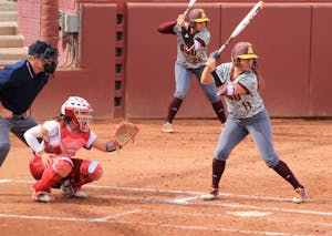 Senior short stop Chelsea Gonzales (11), lines up for a hit&nbsp;in a match against Indiana at Farrington Stadium in Tempe, Arizona on Saturday, Feb. 11th, 2017. The Sun devils won the game 4-2.