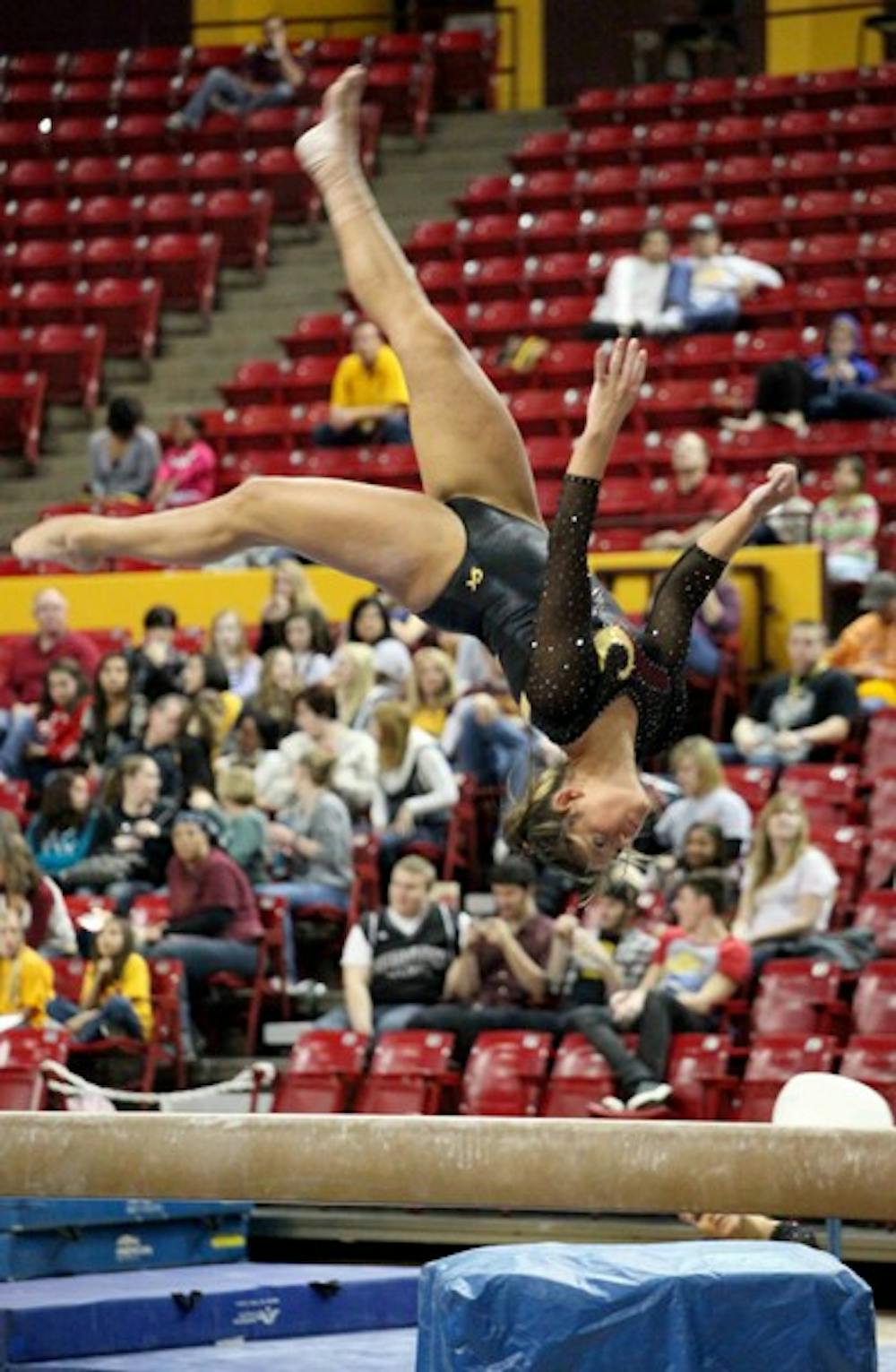 Sophomore Morgan Steigerwalt performs on the beam at a Jan. 10, 2012, meet against Cal. The team will face Oklahoma in their first meet of the season on Saturday. (Photo by Beth Easterbrook)