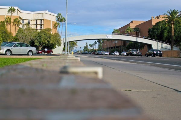 RED GOLD: Freshman education major Nichole Petteruti gives blood inside a United Blood Services bus parked outside of the Memorial Union on Monday. "I figure I'm healthy and I can, so why not help people?" she said.  (Photo by Lisa Bartoli)